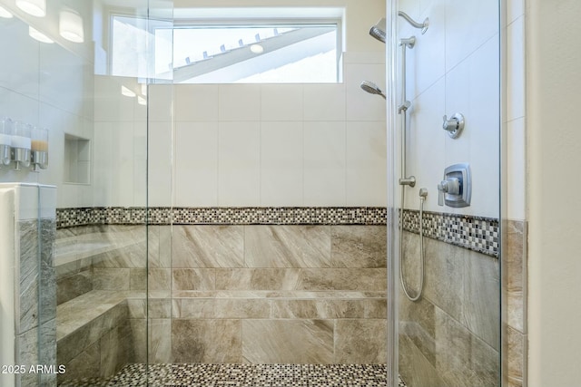 bathroom featuring tiled shower