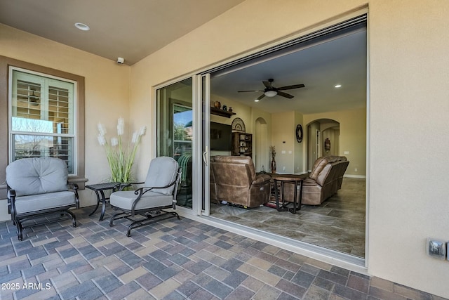 view of patio with ceiling fan