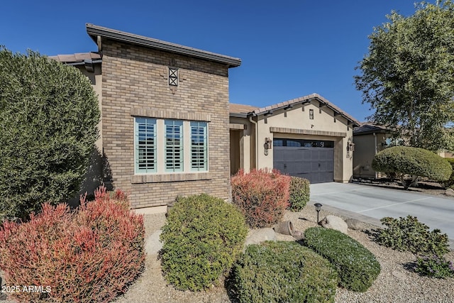 view of front of home with a garage