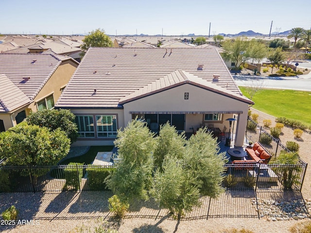 back of house featuring a patio