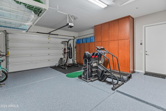 garage featuring a garage door opener