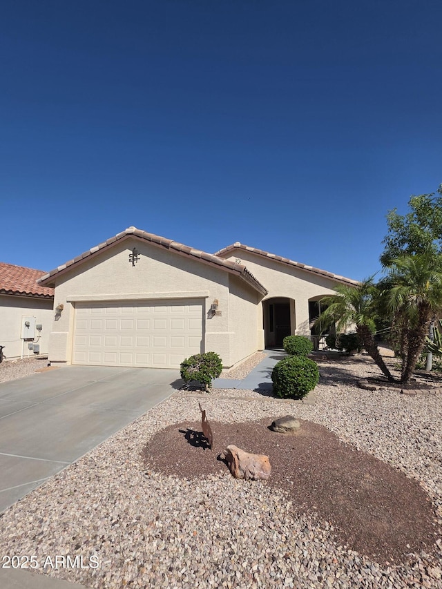 22508 W Antelope Trl, Buckeye, AZ 85326 - single story home with driveway, an attached garage, stucco siding, and a tiled roof