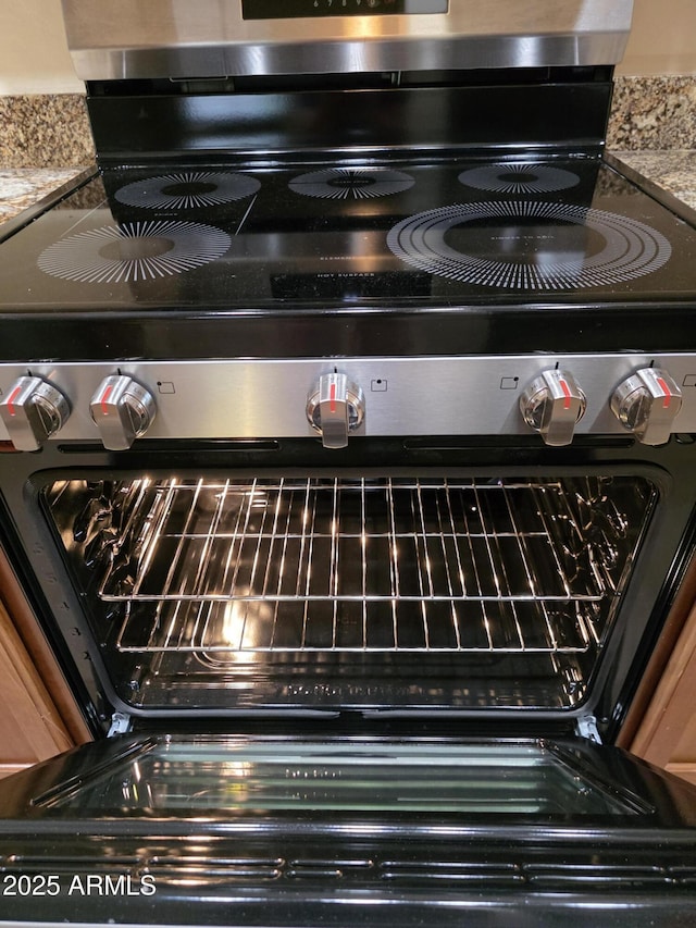 22508 W Antelope Trl, Buckeye, AZ 85326 - kitchen view of stainless steel range with electric cooktop