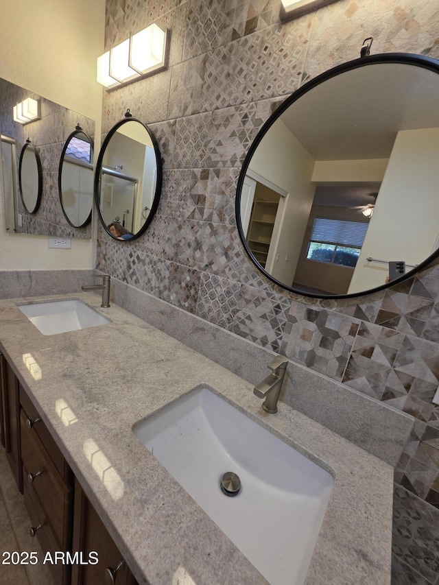 22508 W Antelope Trl, Buckeye, AZ 85326 - full bath with tile walls, double vanity, and tasteful backsplash