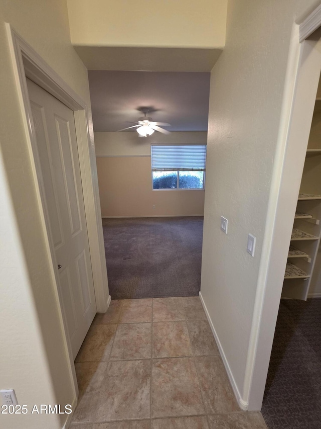 22508 W Antelope Trl, Buckeye, AZ 85326 - hall with light carpet and baseboards