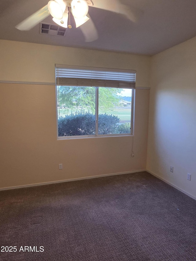 22508 W Antelope Trl, Buckeye, AZ 85326 - empty room with a ceiling fan, carpet floors, and baseboards