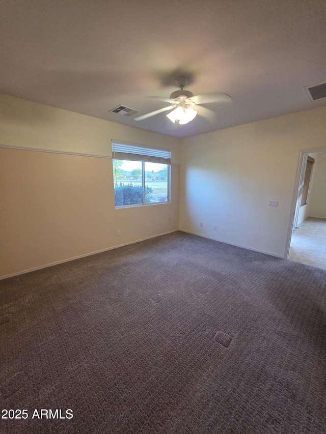 22508 W Antelope Trl, Buckeye, AZ 85326 - unfurnished room featuring a ceiling fan, light colored carpet, and baseboards