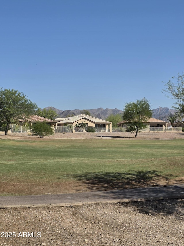 22508 W Antelope Trl, Buckeye, AZ 85326 - view of community featuring a mountain view and a yard