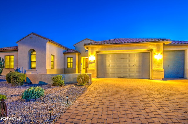 view of front of house with a garage