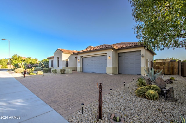 view of front of property with a garage