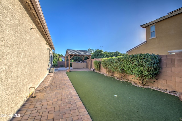 view of yard featuring a patio and a gazebo