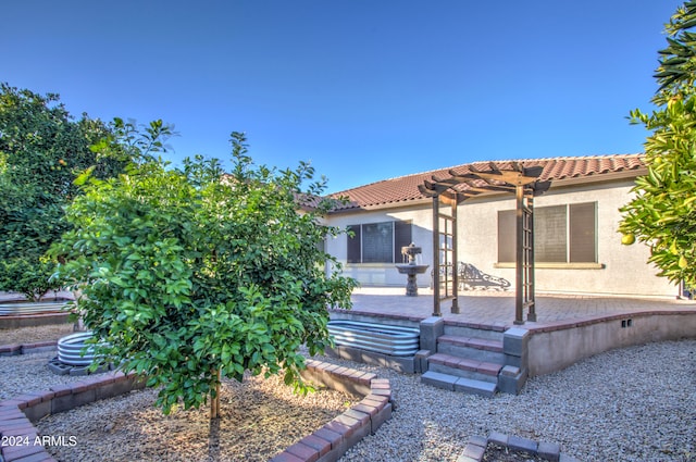 exterior space featuring a pergola and a patio area