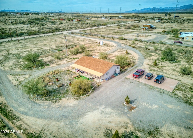 bird's eye view with a mountain view and a rural view