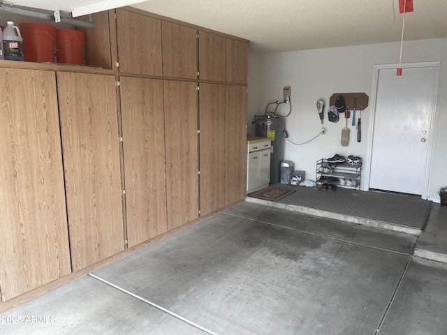 garage featuring water heater