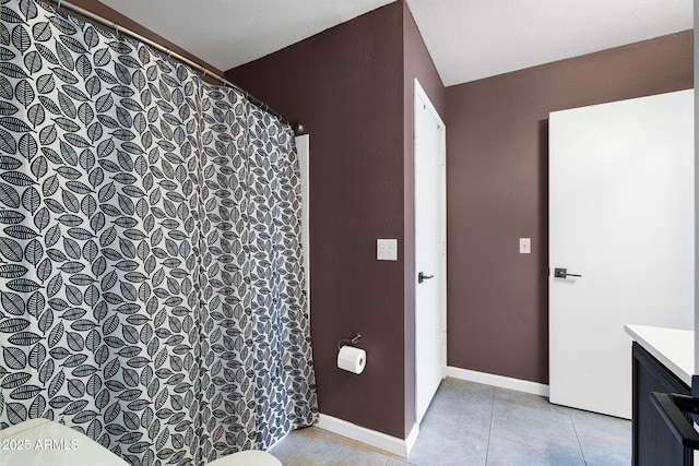 1120 N Val Vista Dr Unit 110, Gilbert, AZ 85234 - bathroom featuring tile patterned flooring, vanity, and baseboards