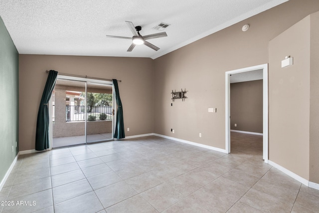 1120 N Val Vista Dr Unit 110, Gilbert, AZ 85234 - spare room with vaulted ceiling, a ceiling fan, light tile patterned flooring, a textured ceiling, and baseboards
