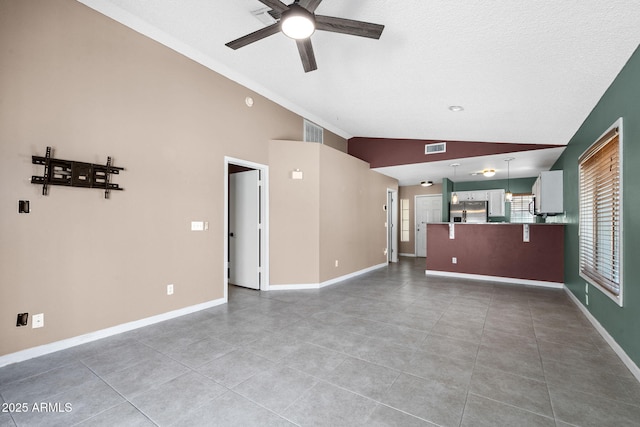 1120 N Val Vista Dr Unit 110, Gilbert, AZ 85234 - unfurnished living room with vaulted ceiling, ceiling fan, baseboards, and light tile patterned flooring