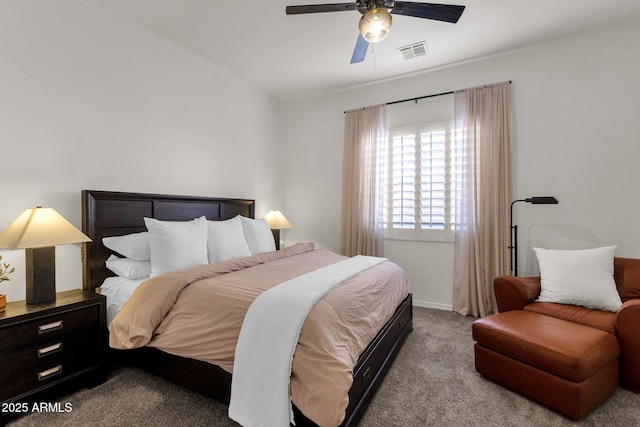 bedroom with baseboards, ceiling fan, carpet flooring, and visible vents
