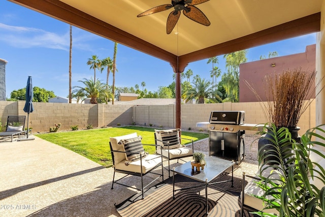view of patio with a fenced backyard, ceiling fan, outdoor lounge area, and area for grilling