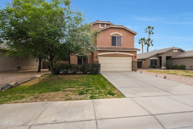 mediterranean / spanish-style home with a garage and a front yard