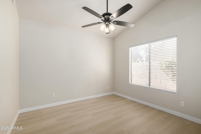 319 N Riata St, Gilbert, AZ 85234 - empty room with light wood-style flooring, vaulted ceiling, and ceiling fan