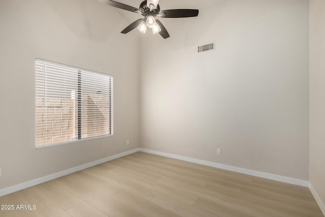 319 N Riata St, Gilbert, AZ 85234 - empty room featuring light wood finished floors and a ceiling fan