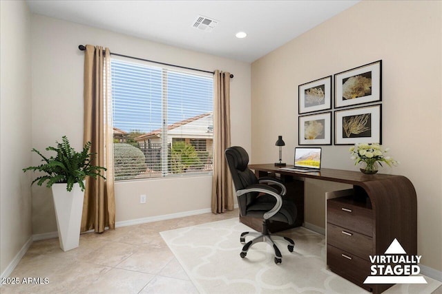 home office featuring light tile patterned flooring