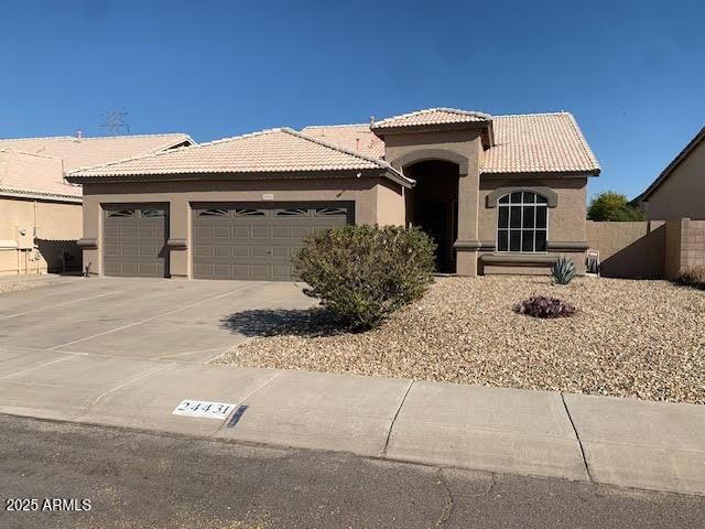 view of front of home featuring a garage