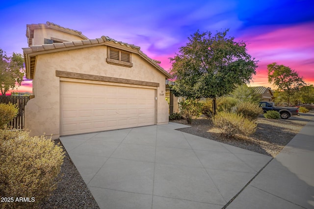 view of front of property with a garage