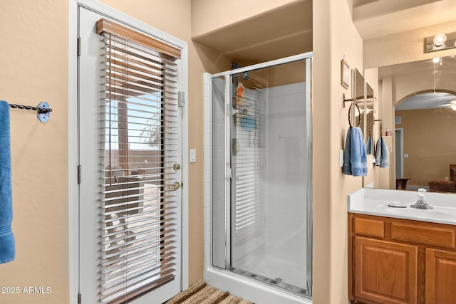 bathroom featuring vanity and walk in shower