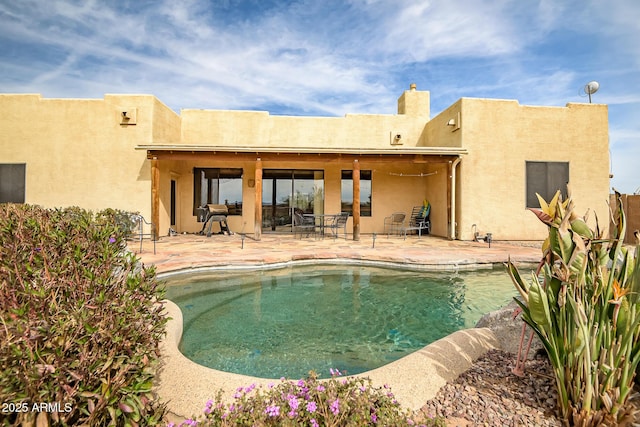 view of pool with a patio area