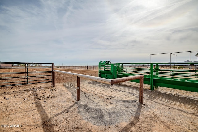 surrounding community with an outbuilding and a rural view