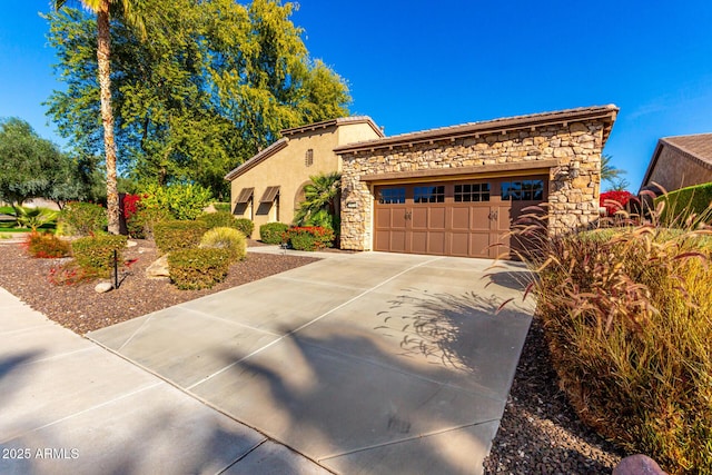 view of front of property with a garage