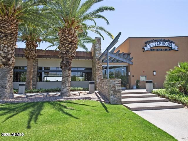28831 N 128th Dr, Peoria, AZ 85383 - exterior space featuring a front yard and stucco siding