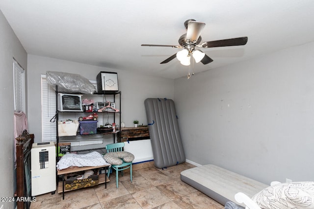 bedroom featuring ceiling fan