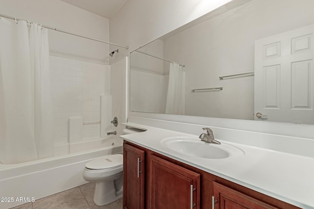 full bathroom featuring tile patterned flooring, vanity, toilet, and shower / bath combo with shower curtain