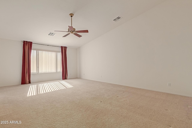 unfurnished room with high vaulted ceiling, ceiling fan, and carpet flooring