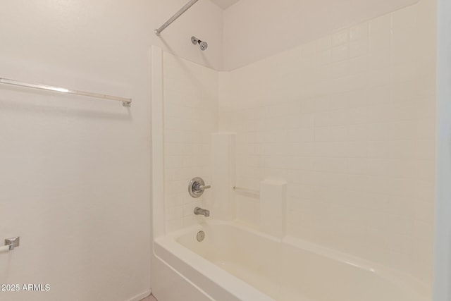 bathroom with shower / bathtub combination