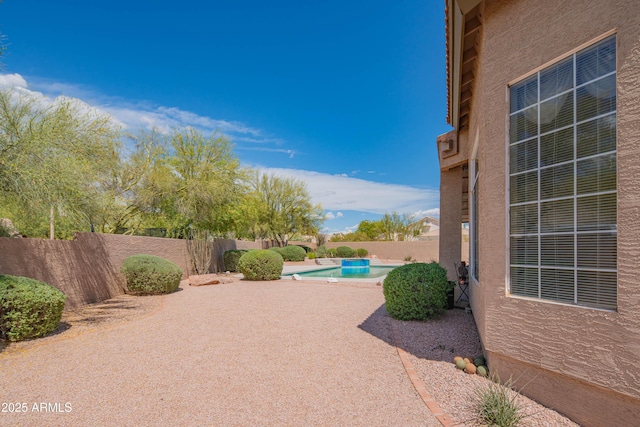 view of patio with a fenced backyard and a fenced in pool