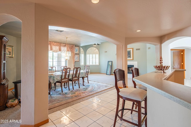 dining room with visible vents, baseboards, marble finish floor, an inviting chandelier, and recessed lighting