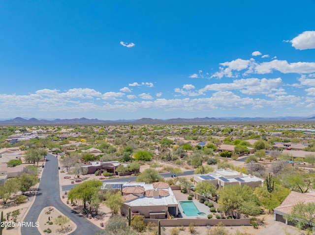 birds eye view of property with a mountain view and a residential view