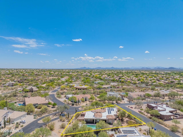 drone / aerial view featuring a mountain view and a residential view