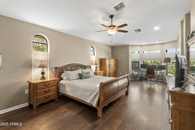 bedroom featuring dark wood-type flooring and ceiling fan