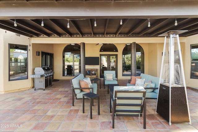 view of patio / terrace featuring a grill and an outdoor hangout area