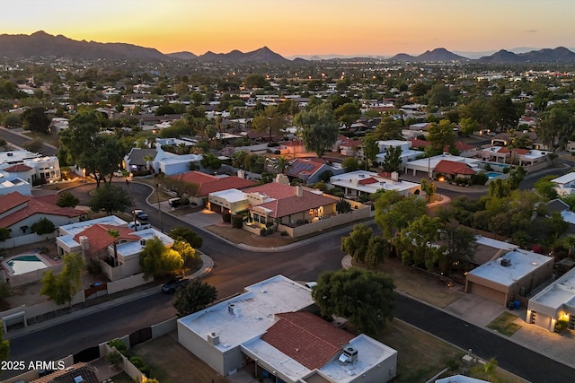 aerial view at dusk with a mountain view