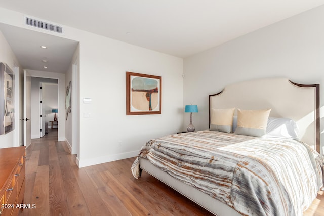 bedroom featuring light wood-type flooring