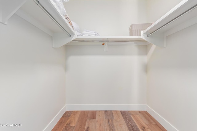 6311 E Phoenician Blvd Unit 18, Scottsdale, AZ 85251 - walk in closet featuring light wood finished floors