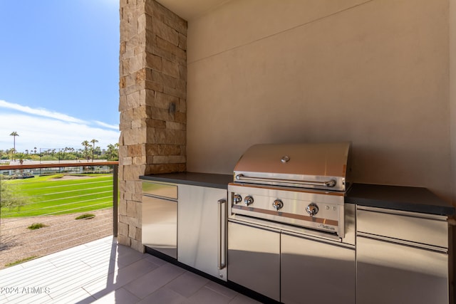 view of patio / terrace with exterior kitchen and grilling area