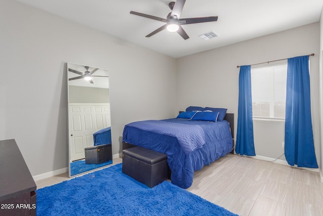 bedroom featuring visible vents, ceiling fan, and baseboards