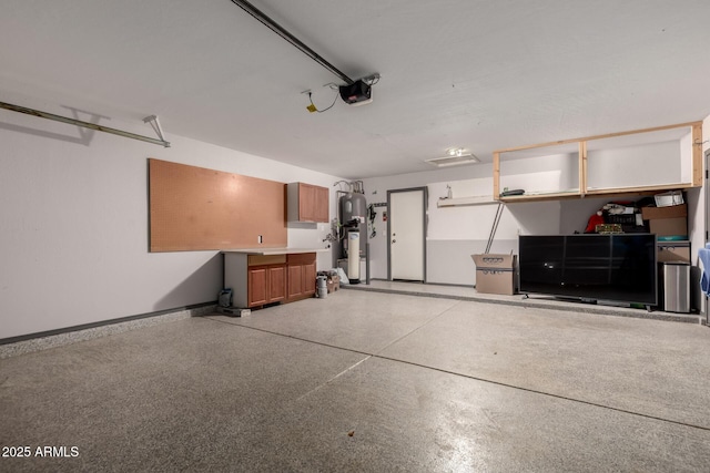 garage with a garage door opener, water heater, and baseboards